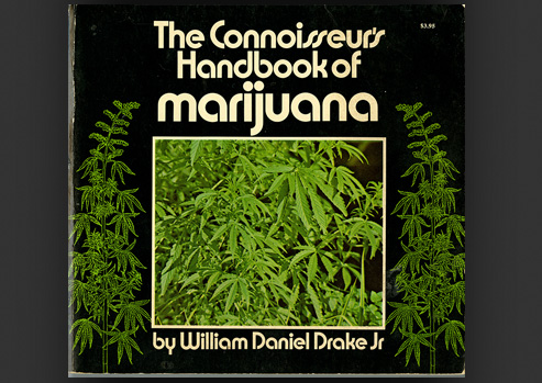 Photograph of a Book with marijuana plants on the cover.